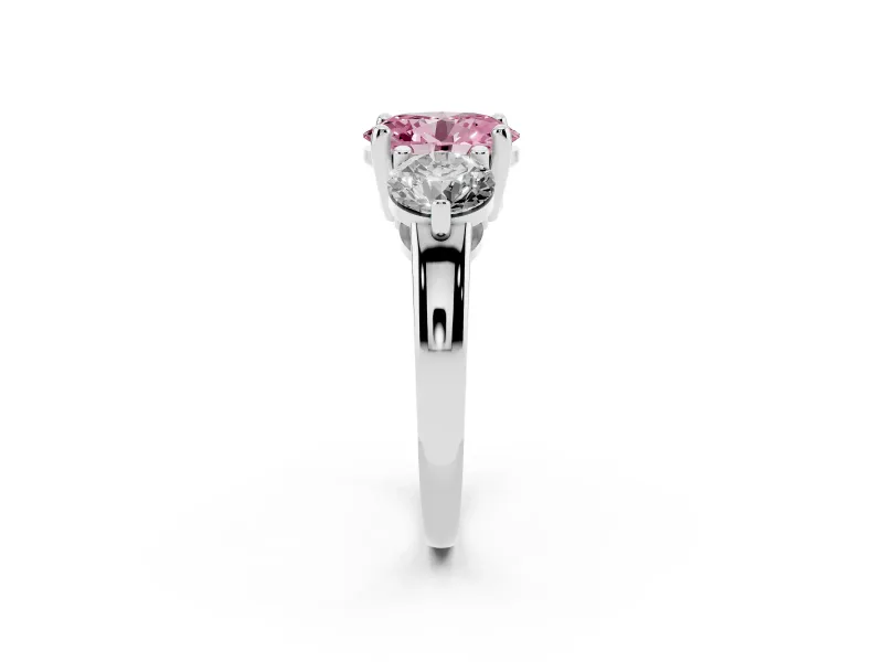 Fancy Pink Oval Cut Diamond Three-Stone Ring Set in Platinum with Prong Setting and Classic Band