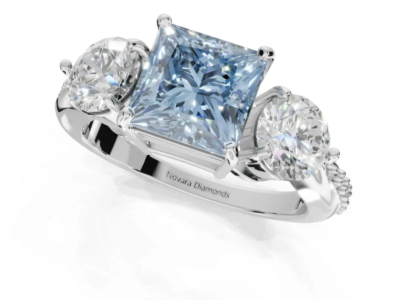 Princess Cut Three Stone Engagement Ring Setting for a Fancy Blue Lab-Grown Diamond | Tapered Pave Band | Platinum