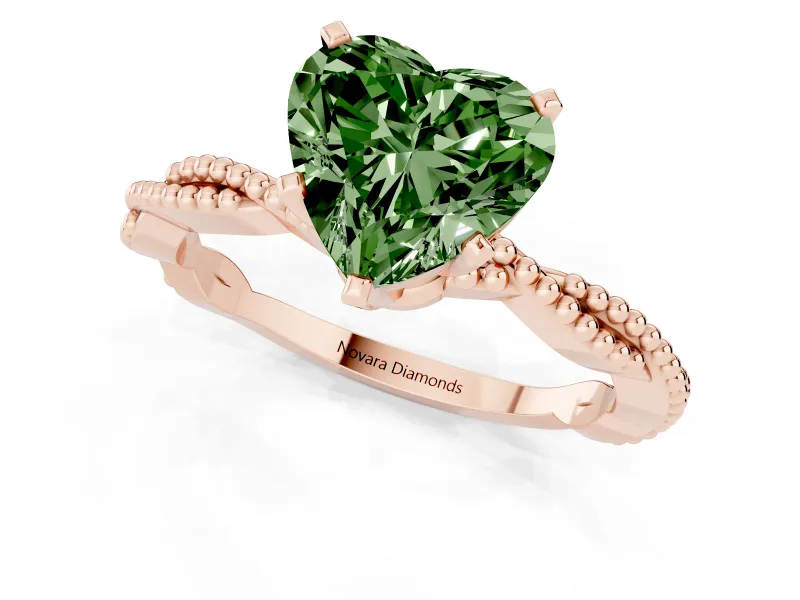 Fancy Green Heart Cut Diamond Solitaire Ring Set in Rose gold with Twisted Band and Bead Prong Setting