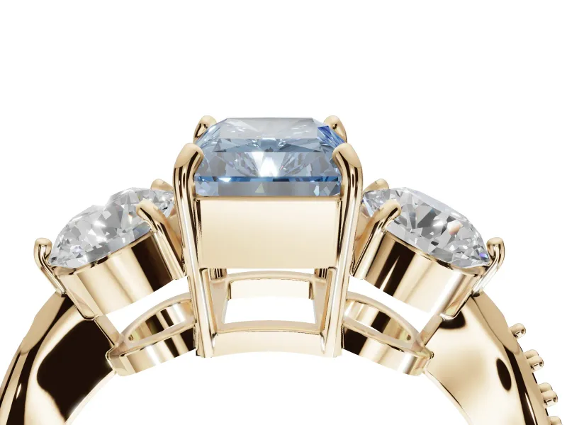 Radiant Cut Three Stone Engagement Ring Setting for a Fancy Blue Lab-Grown Diamond | Tapered Pave Band | Yellow Gold