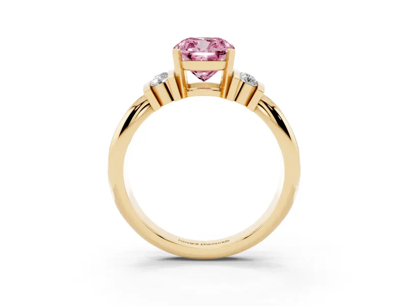 Fancy Pink Three-Stone Cushion Cut Diamond Channel Set Ring Set in Yellow gold with Bar Prongs