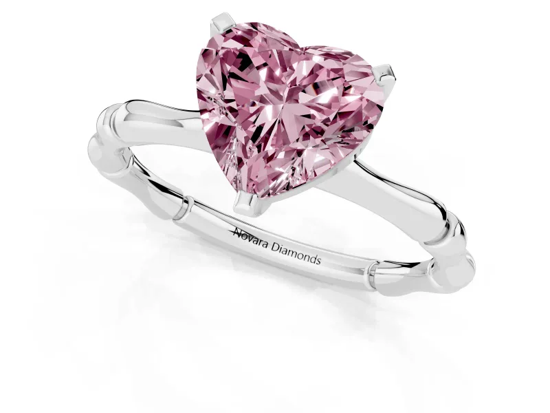 Fancy Pink Heart Cut Diamond Solitaire Ring Set in Silver with Bamboo Band and Prong Setting