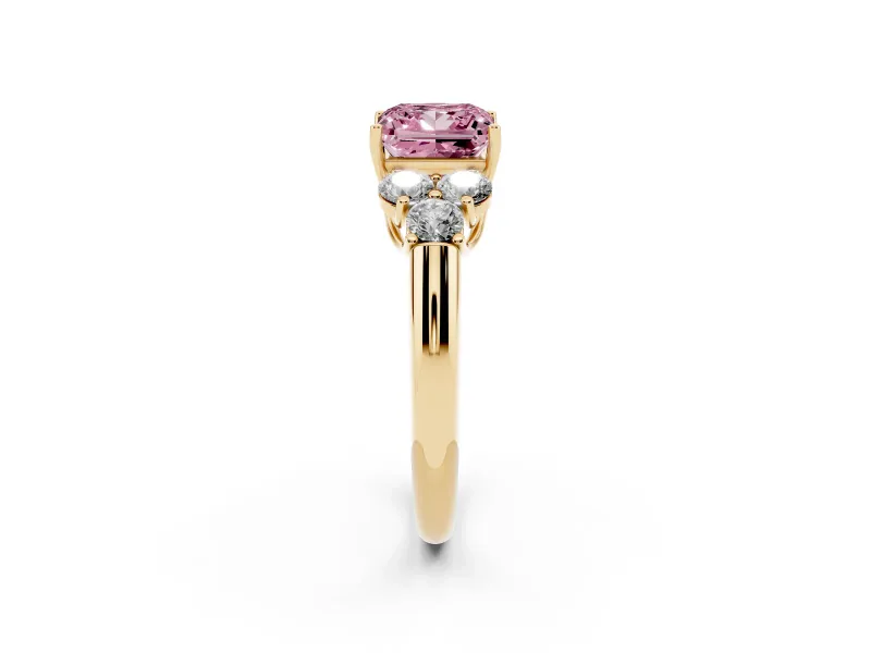 Fancy Pink Princess Cut Diamond Cluster Ring Set in Yellow gold with Round Accent Stones and Prong Setting on a Plain Band