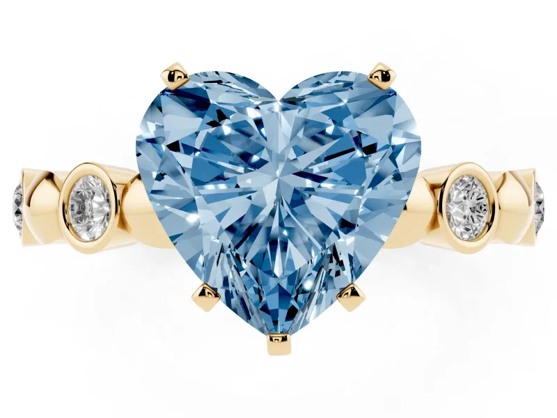 Fancy Blue Heart Cut Diamond Solitaire Ring Set in Yellow gold with Bezel-Set Accents on Beaded Band and Prong Setting