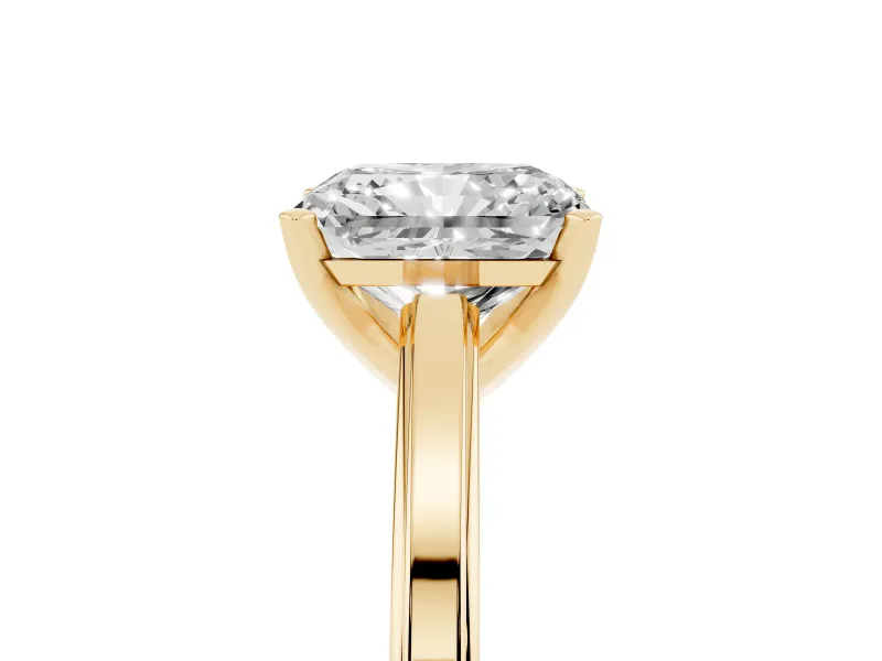 Radiant Cut Diamond Solitaire Ring Set in Yellow gold with Prong Setting and Classic Band