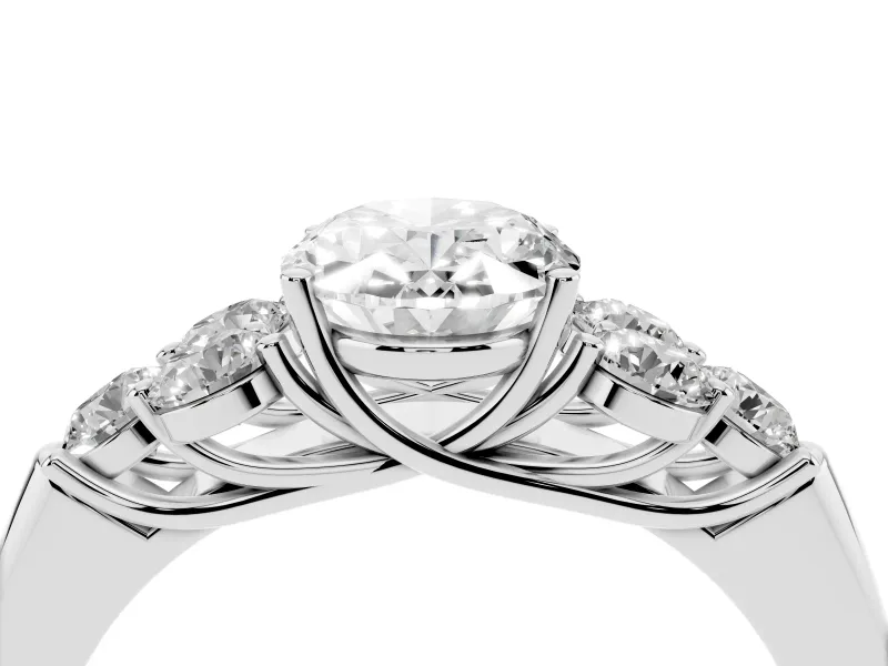 Oval Cut Diamond Cluster Ring Set in Platinum with Round Accent Stones and Prong Setting on a Plain Band