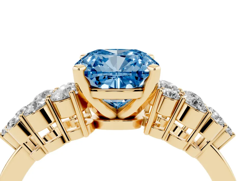 Fancy Blue Cushion Cut Diamond Cluster Engagement Ring Set in Yellow gold with Pavé Band and Prong Setting