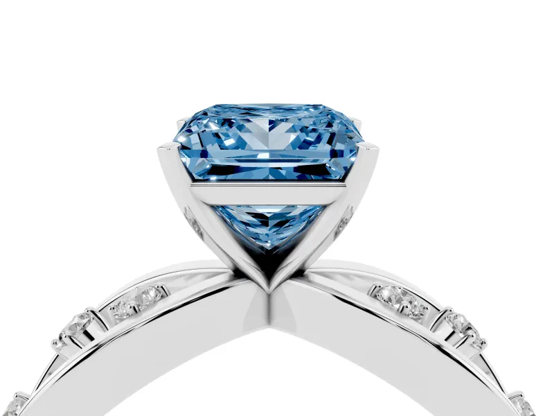 Fancy Blue Princess Cut Diamond Solitaire Ring Set in Platinum with Side Stones on Criss-Cross Band and Prong Setting
