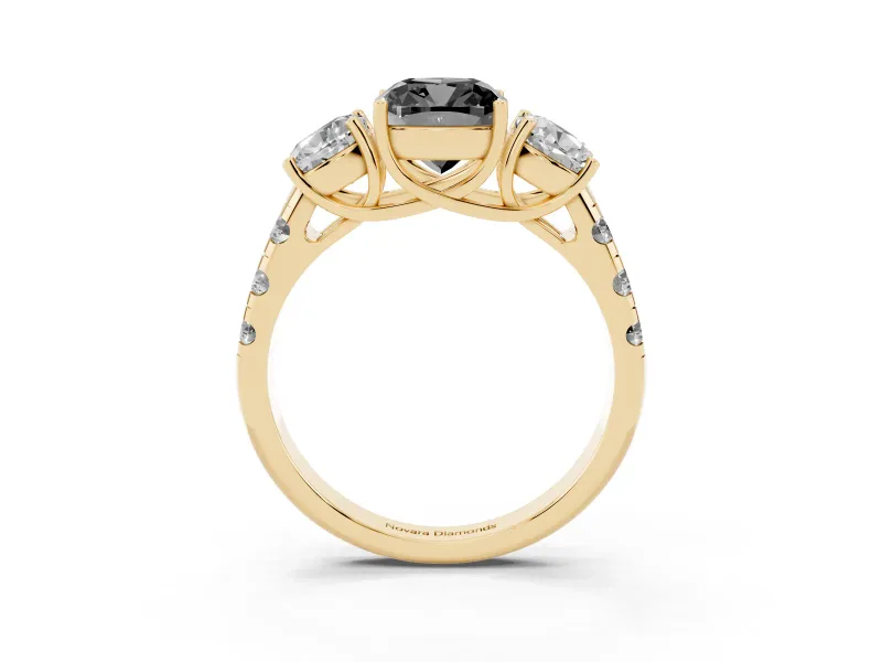 Fancy Black Cushion Cut Diamond Three-Stone Ring Set in Yellow gold with Pavé Band