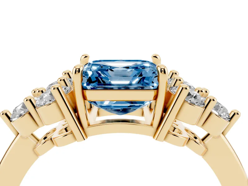 Fancy Blue Asscher Cut Diamond Solitaire Ring Set in Yellow gold with Cluster Accents on Each Side