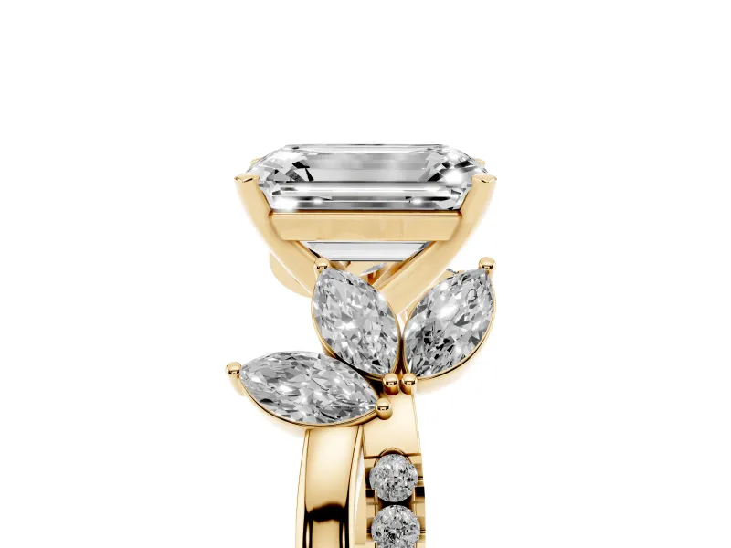 Emerald Cut Diamond Floral Vine Solitaire Engagement Ring Set in Yellow gold with Marquise Leaves