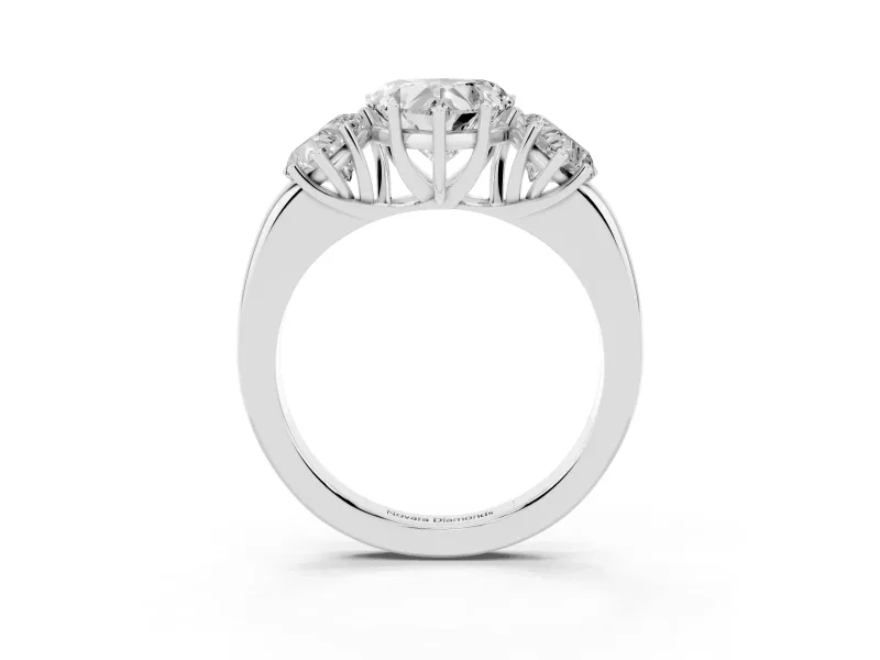 Heart Cut Diamond Three-Stone Ring Set in Silver with Bold Center and Classic Band