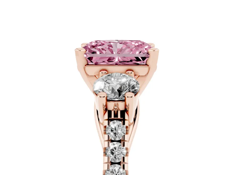 Fancy Pink Three-Stone Radiant Cut Diamond Pavé Band Ring Set in Rose gold with Prong-Set Trio