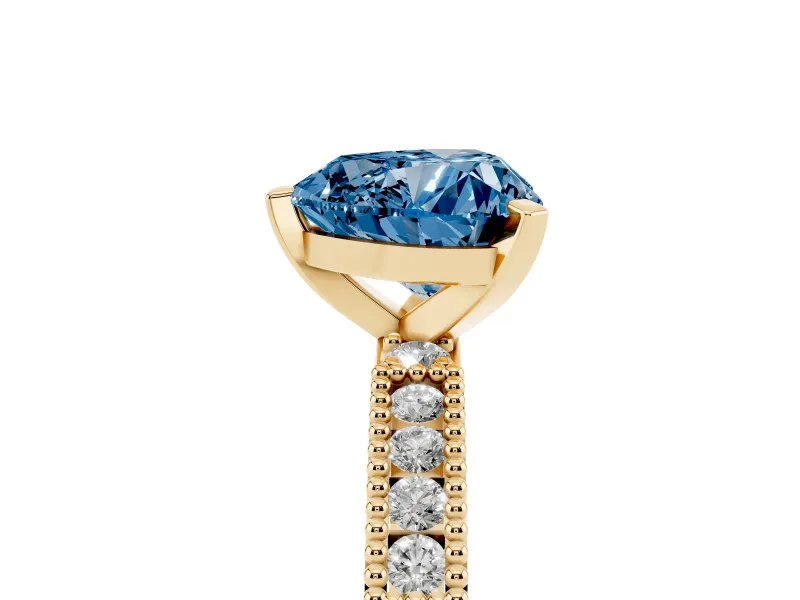 Fancy Blue Heart Cut Diamond Solitaire Ring Set in Yellow gold with Slim Pavé Band and Prong Setting