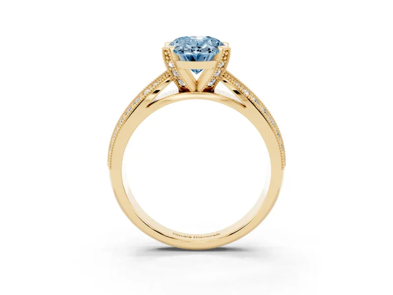 Fancy Blue Oval Cut Diamond Solitaire Ring Set in Yellow gold with Milgrain Double Row Round Pavé Band
