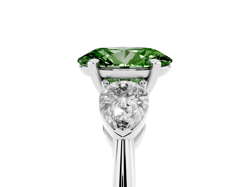 Fancy Green Three-Stone Oval Cut Diamond Ring Set in White gold with Pear Side Stones and Prong Setting