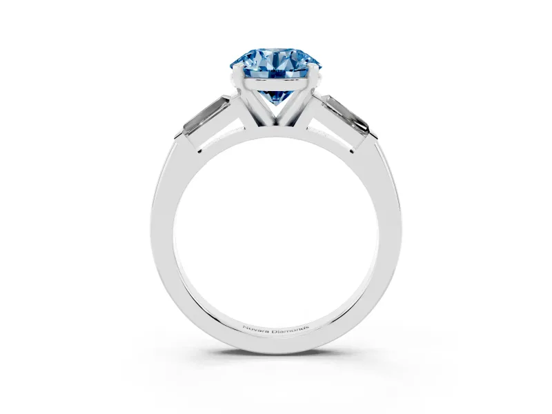 Fancy Blue Round Cut Diamond Solitaire Ring Set in Platinum with Tapered Baguette Side Stones and Prong Setting