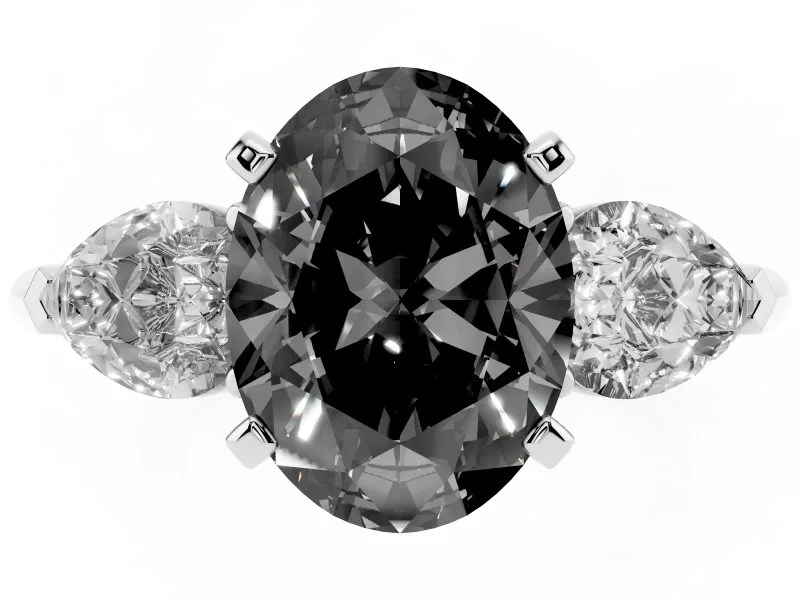 Fancy Black Three-Stone Oval Cut Diamond Ring Set in White gold with Pear Side Stones and Prong Setting