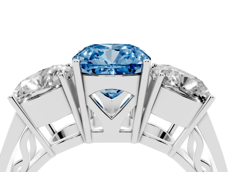 Fancy Blue Cushion Cut Diamond Three-Stone Ring Set in White gold with Textured Band