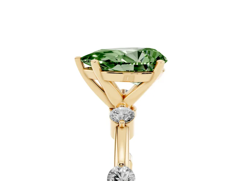 Fancy Green Pear Cut Diamond Solitaire Ring Set in Yellow gold with Bezel Set Side Stones and Prong Setting