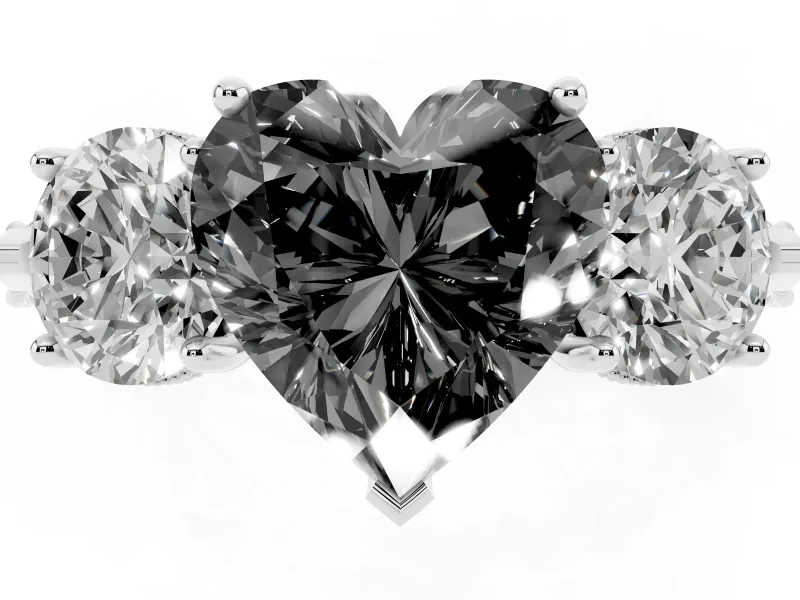 Fancy Black Heart Cut Diamond Three-Stone Ring Set in White gold with Milgrain Band