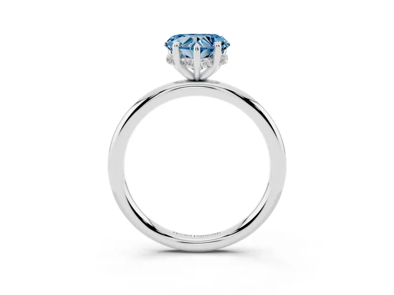 Fancy Blue Heart Cut Diamond Solitaire Ring Set in White gold with Thin Band and Prong Setting