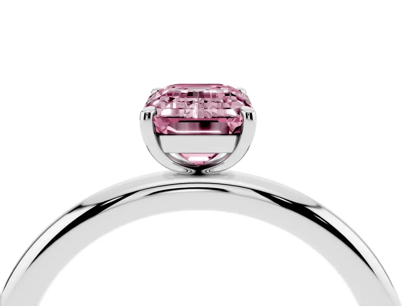 Fancy Pink Emerald Cut Diamond Solitaire Ring Set in Silver with Prong Setting on a Polished Plain Band