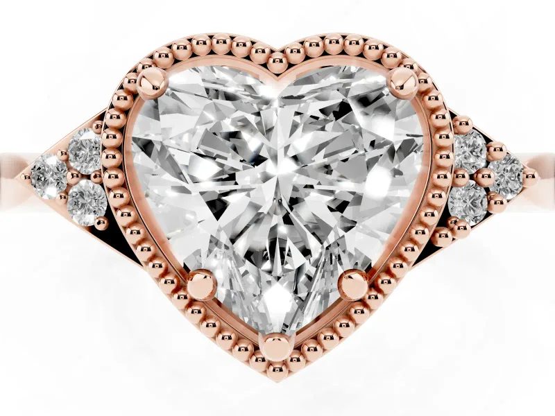 Heart Cut Diamond Milgrain Solitaire Ring Set in Rose gold with Tapered Pavé Band and Prong Setting
