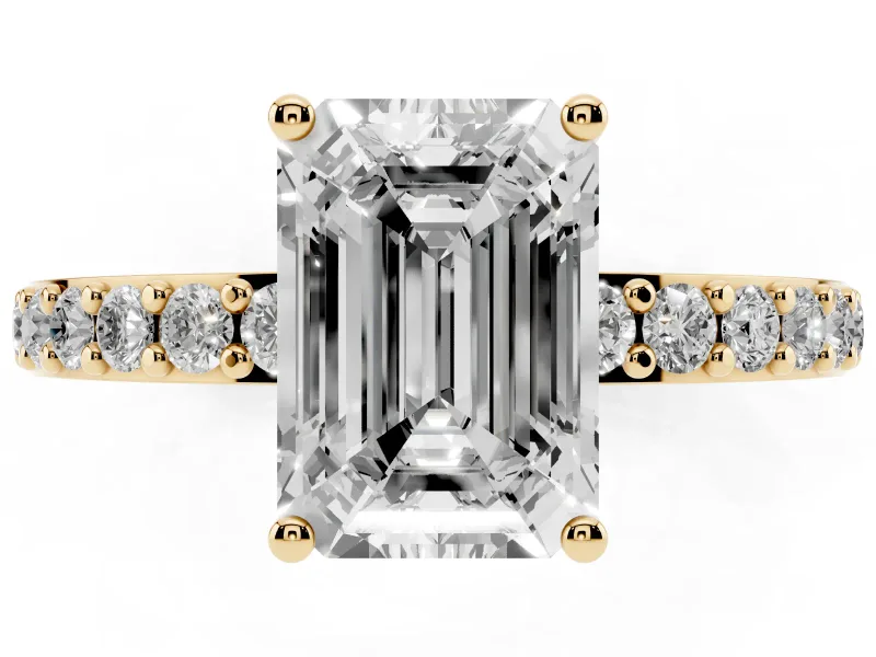 Emerald Cut Diamond Solitaire Set in Yellow gold with Round Pavé Band and Prong Setting