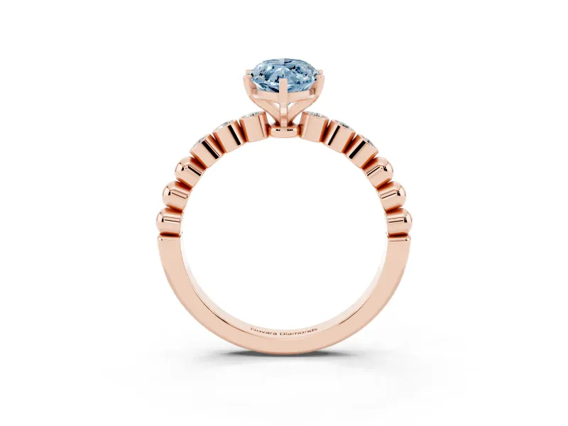 Fancy Blue Marquise Cut Diamond Solitaire Engagement Ring Set in Rose gold with Bezel Accents on Beaded Band