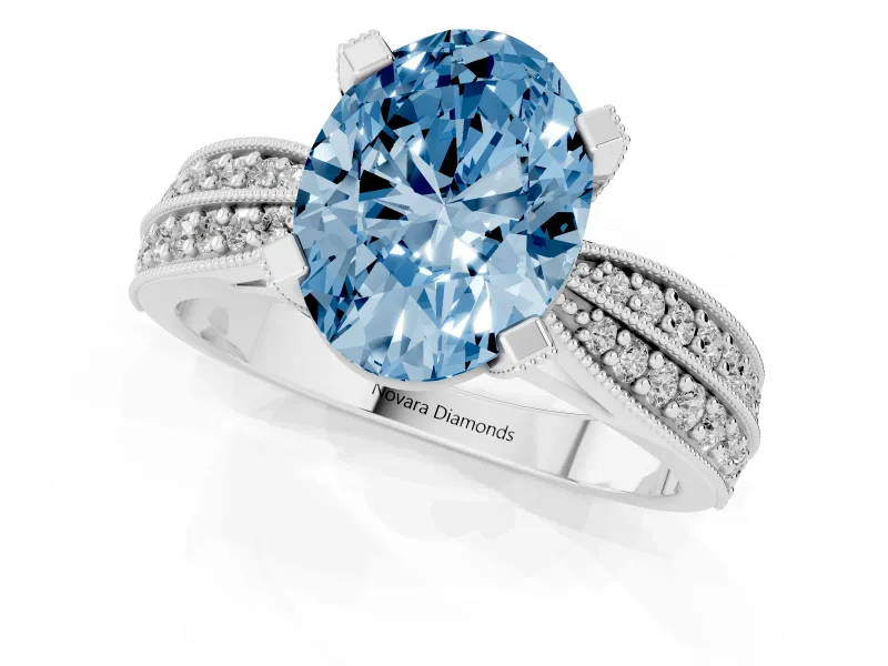 Fancy Blue Oval Cut Diamond Solitaire Ring Set in Platinum with Milgrain Double Row Round Pavé Band
