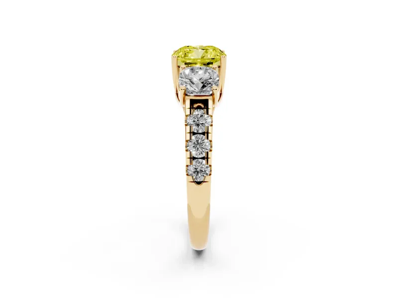 Fancy Yellow Cushion Cut Diamond Three-Stone Ring Set in Yellow gold with Pavé Band