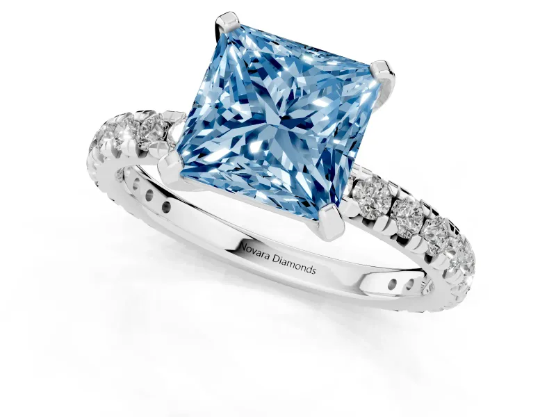 Fancy Blue Princess Cut Diamond Pavé Solitaire Ring Set in Platinum with Round Band and Prong Setting