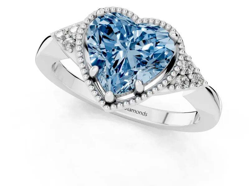 Fancy Blue Heart Cut Diamond Milgrain Solitaire Ring Set in Platinum with Tapered Pavé Band and Prong Setting
