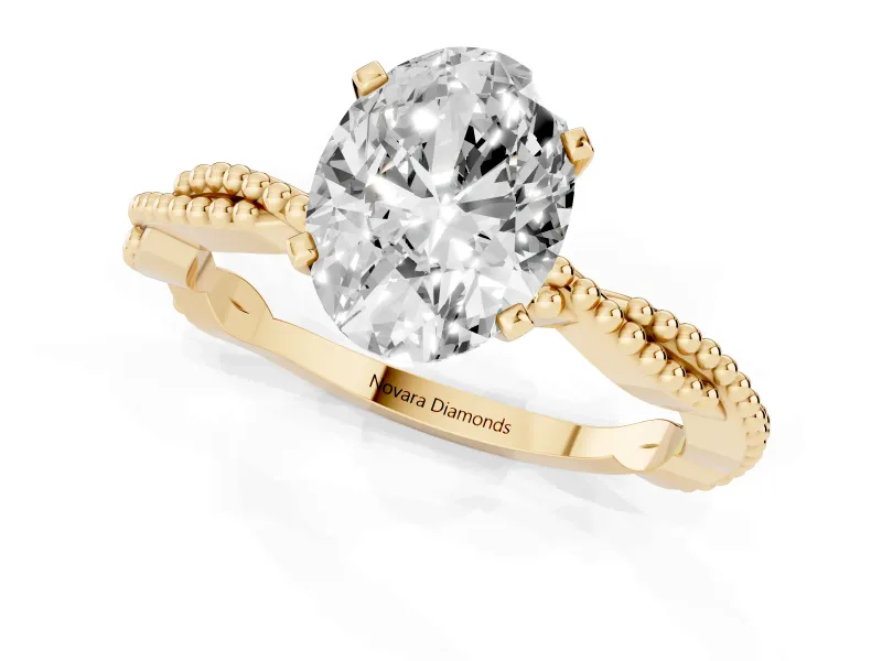 Oval Cut Diamond Solitaire Ring Set in Yellow gold with Twisted Band and Bead Prong Setting
