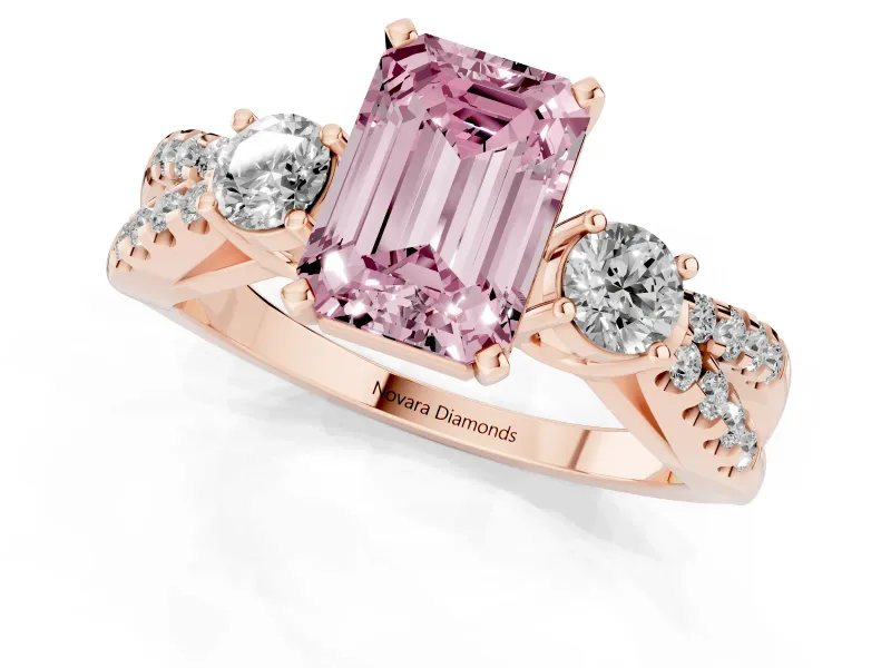 Fancy Pink Emerald Cut Diamond Three-Stone Ring Set in Rose gold with Pavé Split Shank and Prong Setting