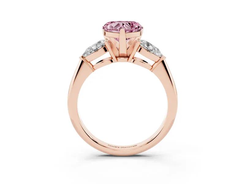 Fancy Pink Three-Stone Heart Cut Diamond Ring Set in Rose gold with Pear Side Stones and Prong Setting