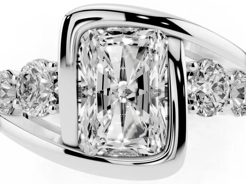 Radiant Cut Diamond Bezel Bypass Ring Set in Silver with Round Accents