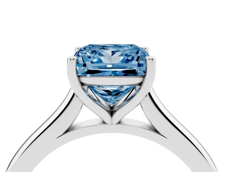Fancy Blue Princess Cut Diamond Solitaire Ring Set in Platinum with Cathedral Band and Prong Setting