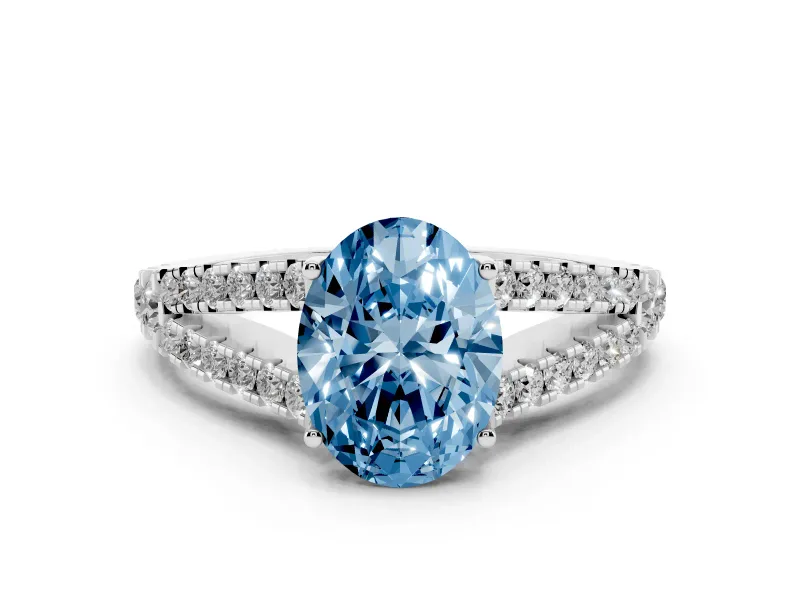 Fancy Blue Oval Cut Diamond Split Shank Pavé Engagement Ring Set in Platinum with Prong-Held Center Stone