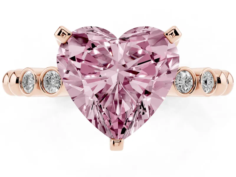 Fancy Pink Heart Cut Diamond Solitaire Engagement Ring Set in Rose gold with Bezel Accents on Beaded Band