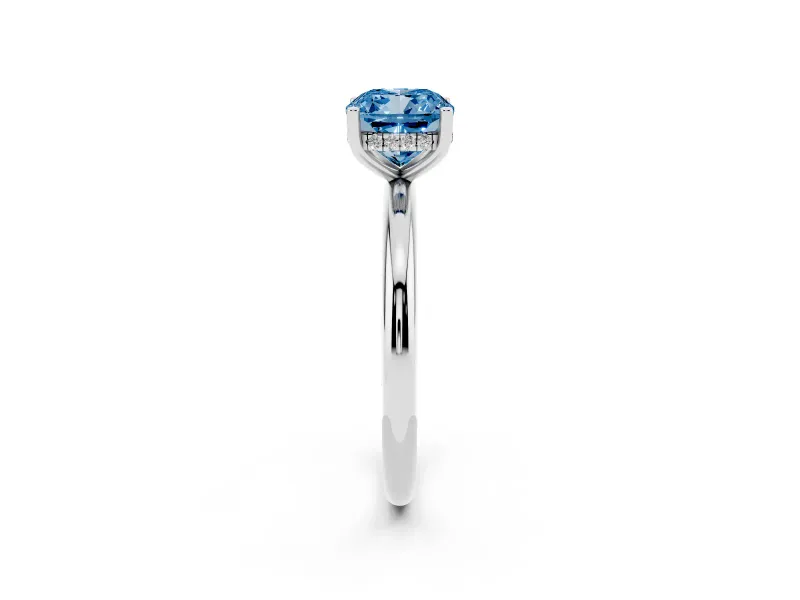 Fancy Blue Cushion Cut Diamond Solitaire Engagement Ring Set in White gold with Prong Setting and Polished Band