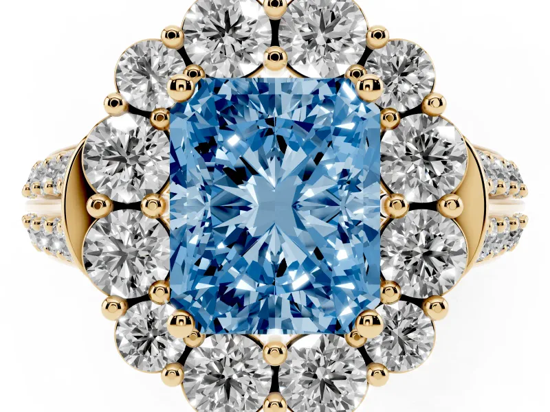 Fancy Blue Radiant Cut Diamond Halo Engagement Ring Set in Yellow gold with Split Shank and Prong Setting