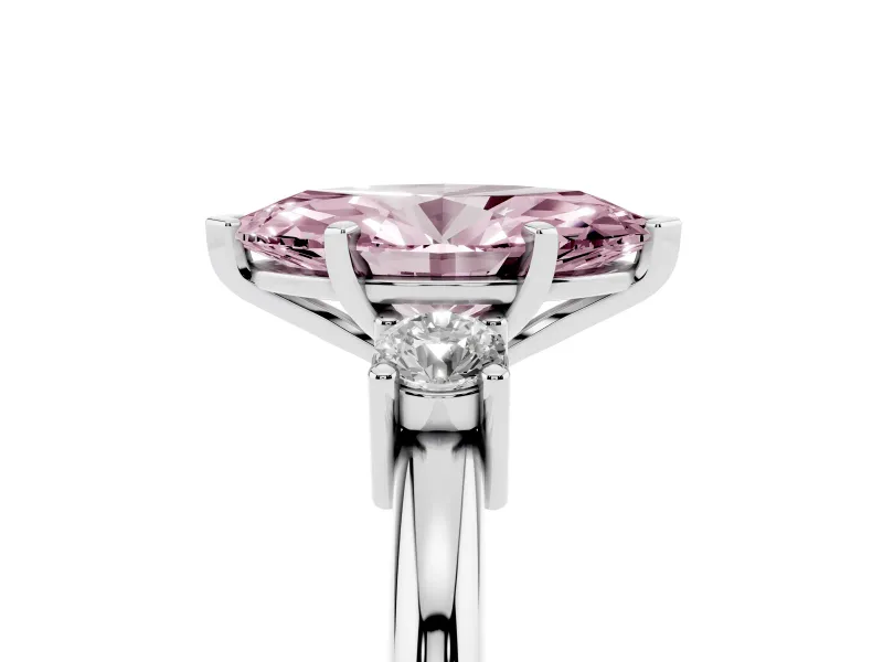 Fancy Pink Three-Stone Marquise Cut Diamond Ring Set in White gold with Prong Setting and Plain Band