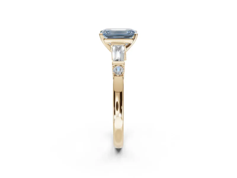 Emerald Cut Tapered Baguette Engagement Ring Setting for a Fancy Blue Lab-Grown Diamond | Bar Set Sides | Yellow Gold