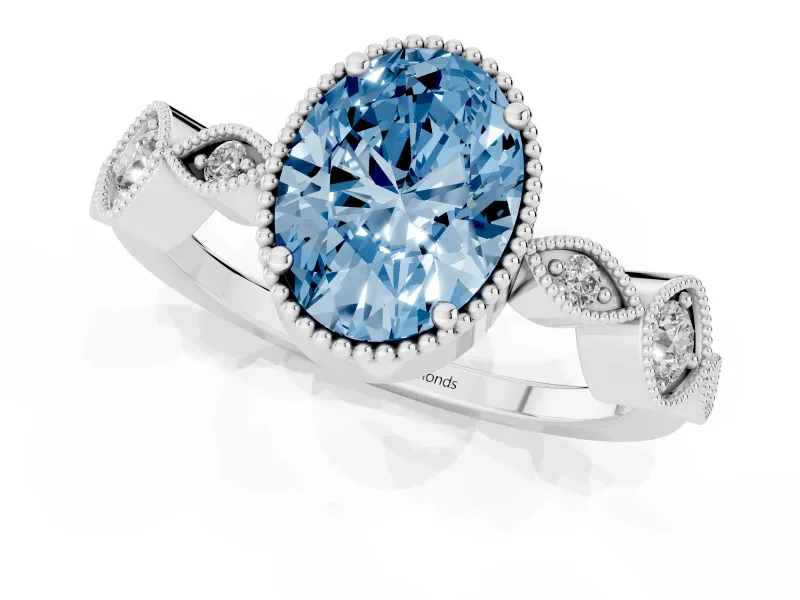 Fancy Blue Oval Cut Diamond Vintage-Inspired Milgrain Ring Set in White gold with Marquise Stations of Round Accents