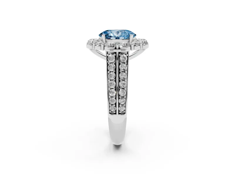 Fancy Blue Oval Cut Diamond Halo Engagement Ring Set in White gold with Split Shank and Prong Setting