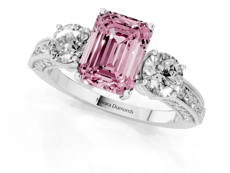 Fancy Pink Emerald Cut Diamond Three-Stone Ring Set in Platinum with Round Side Stones and Pavé Band