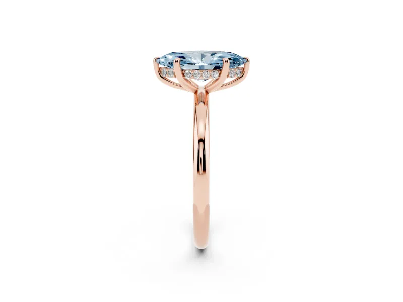 Fancy Blue Marquise Cut Diamond Solitaire Ring Set in Rose gold with Thin Band and Prong Setting