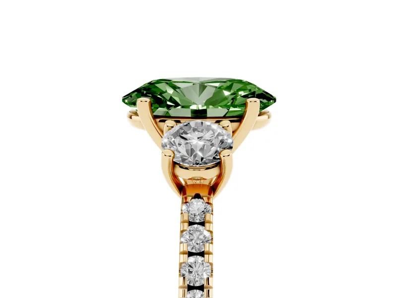 Fancy Green Oval Cut Diamond Three-Stone Ring Set in Yellow gold with Pavé Band and Graduated Sides